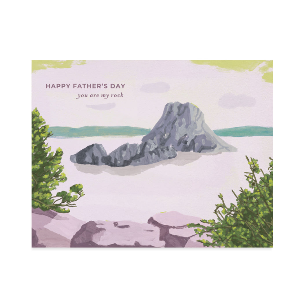 Greeting card design by Canadian Artist, Shira Sela. A beautiful illustration of the seaside overlooking a set of rocks coming out of the water with a sentiment that reads "happy father's day, you are my rock".