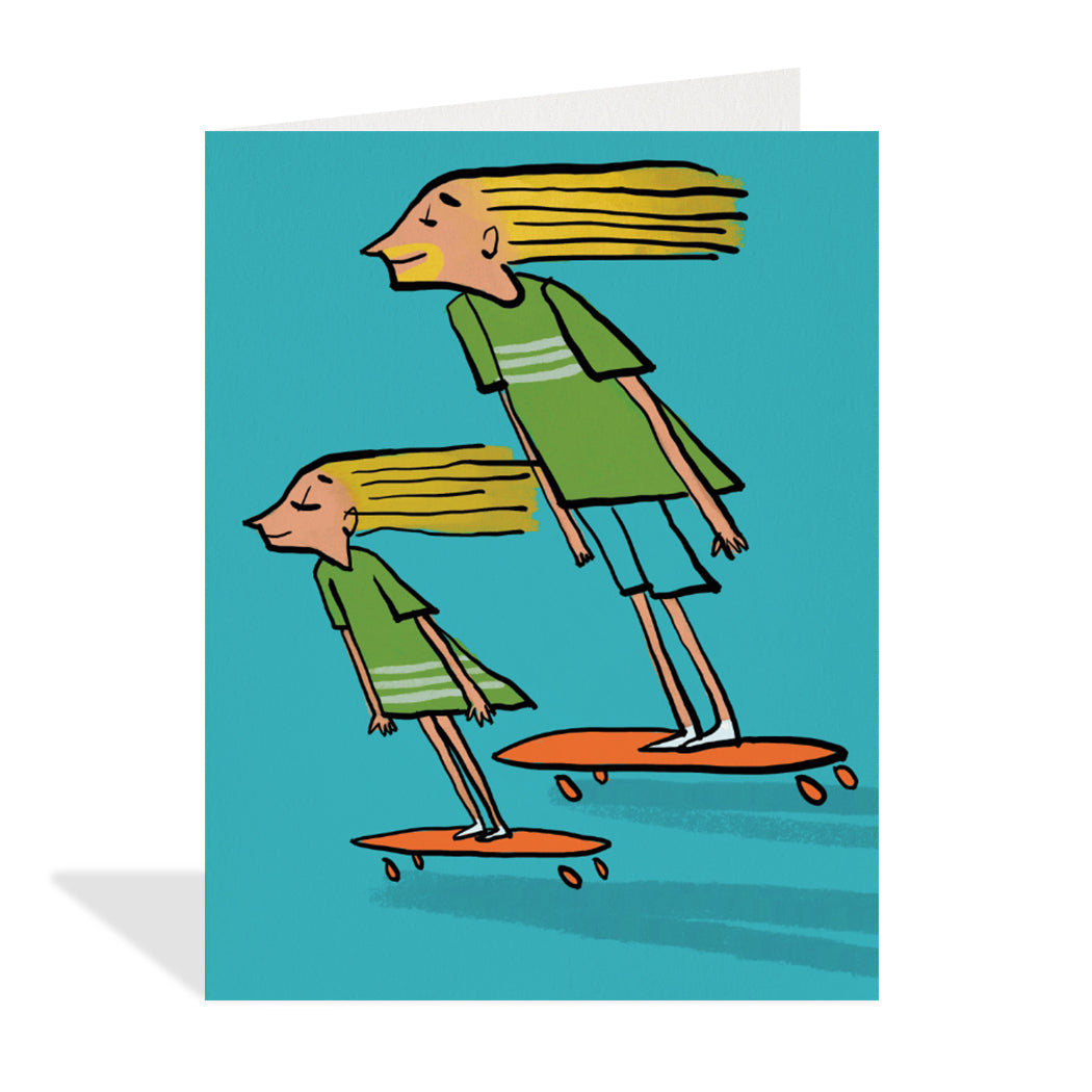 Greeting card design by Carlos Aponte. A charming illustration of a child and their father-figure wearing matching clothing and riding skateboards together on a bright blue background. 