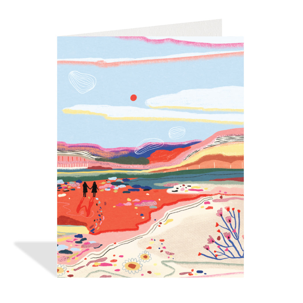 Greeting card designed by Marina Castaldo. A beautiful illustration of two silhouettes walking towards the sun in a lovely landscape scene. 