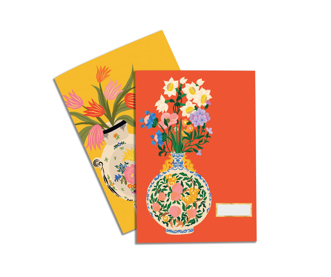 Illustrated Notebook Set by Camille Gressier with one design being a large colourful vase of flowers on a red background and the other design being a large colourful vase of flowers on an orange background with a tiger. 