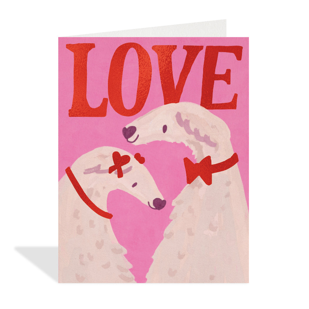 Greeting card design by Erin Mac. A cute illustration of two polar bears with red foiled bow ties and a red foil sentiment that reads "love".