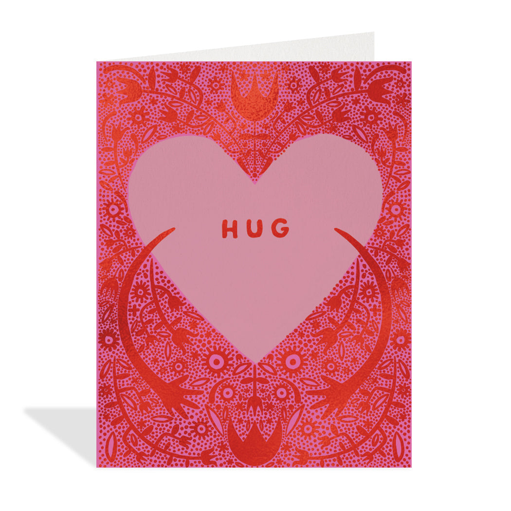 Greeting card design by Hannah Beisang. A vintage-style background with a heart with arms reaching out for a hug. Whole card designed with red foil.