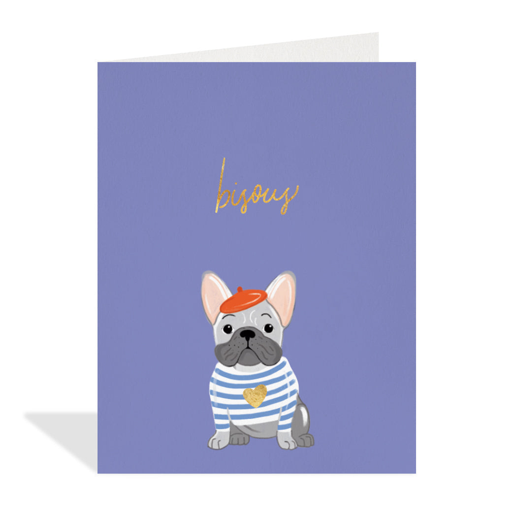 Greeting card design by Canadian Artist, Paige & Willow. A cute illustration of a pug wearing a red beret and a stripped sweater with a gold foil heart. A gold foil sentiment reads "bisous". 