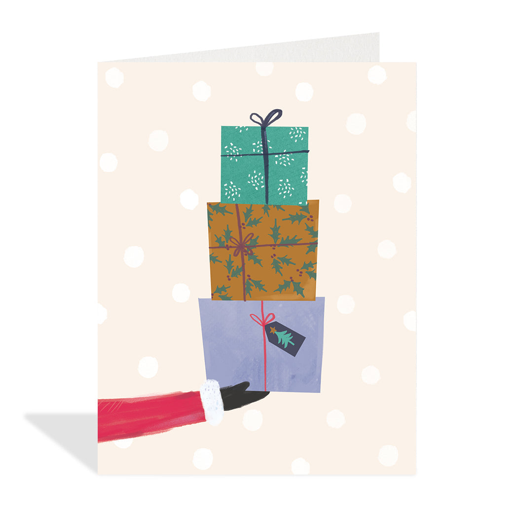 Greeting card illustration by Laura Pantony. Illustration of a stack of presents being held up by Santa's hand on a beige background with white spots